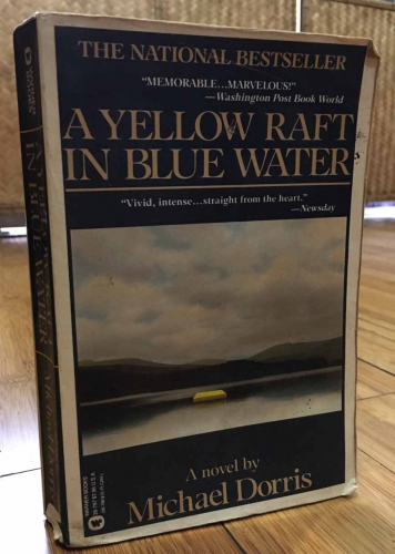 A yellow raft in blue water